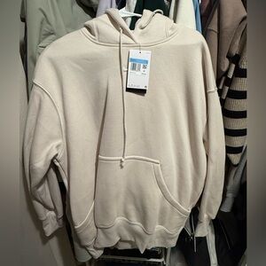 NIKE PHOENIX HOODIE IN LIGHT OREWOOD size medium